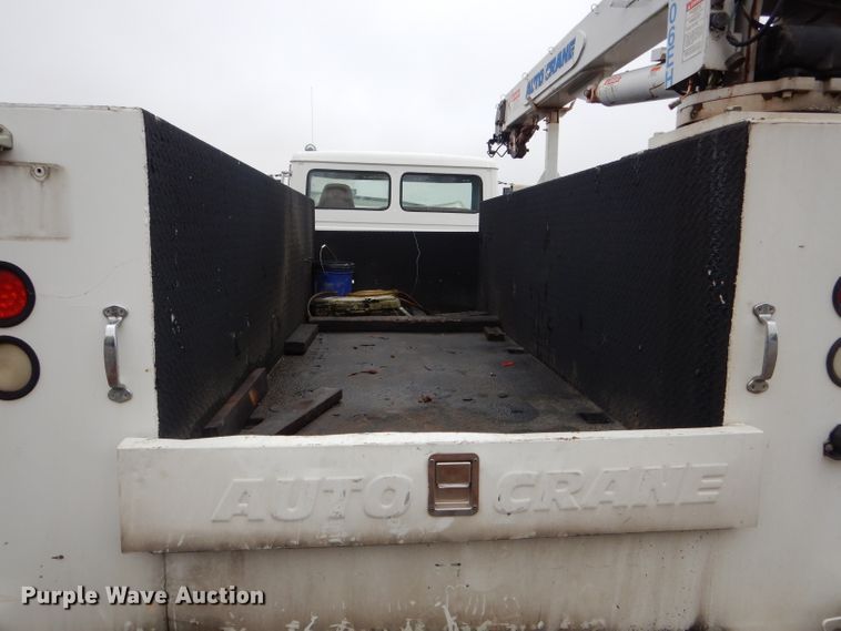 image for item DH6756 2000 Freightliner FL70 utility bed truck with crane