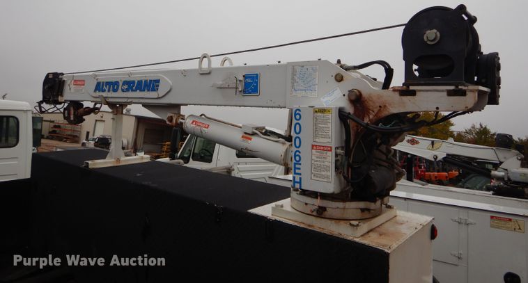 image for item DH6756 2000 Freightliner FL70 utility bed truck with crane