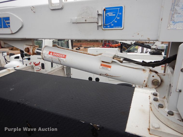 image for item DH6756 2000 Freightliner FL70 utility bed truck with crane