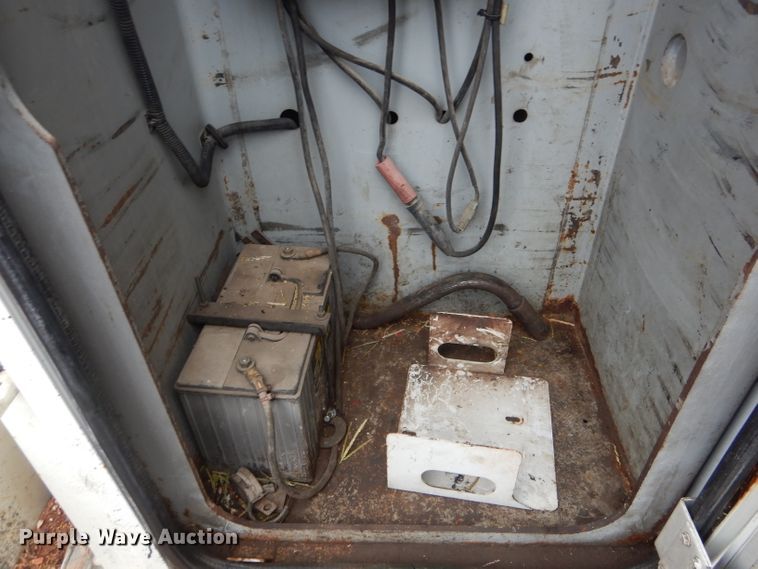 image for item DH6756 2000 Freightliner FL70 utility bed truck with crane