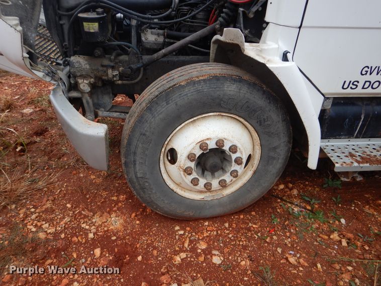 image for item DH6756 2000 Freightliner FL70 utility bed truck with crane