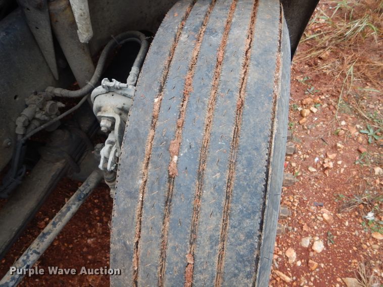 image for item DH6756 2000 Freightliner FL70 utility bed truck with crane