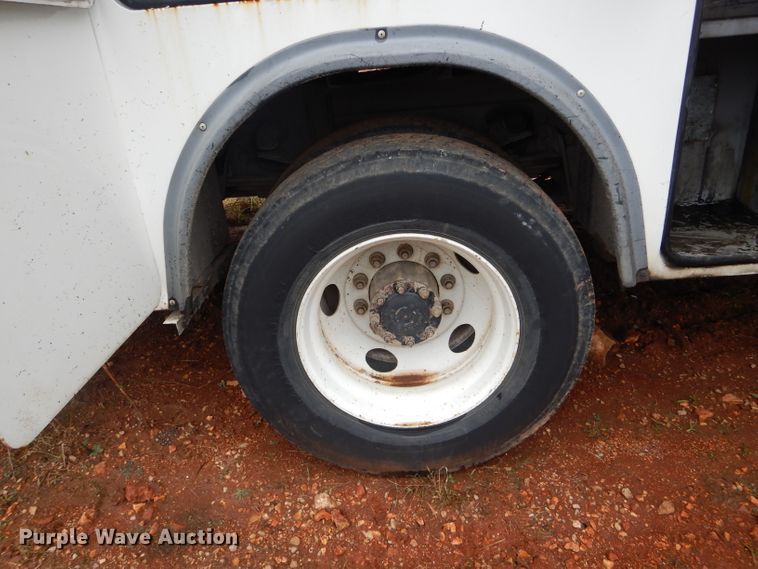 image for item DH6756 2000 Freightliner FL70 utility bed truck with crane