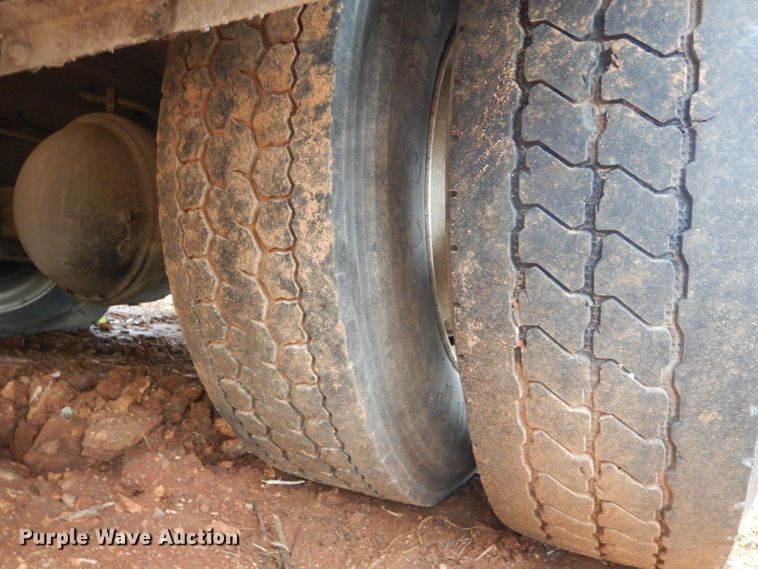 image for item DH6756 2000 Freightliner FL70 utility bed truck with crane