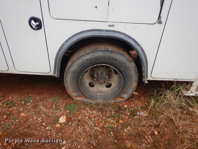 image for item DH6756 2000 Freightliner FL70 utility bed truck with crane