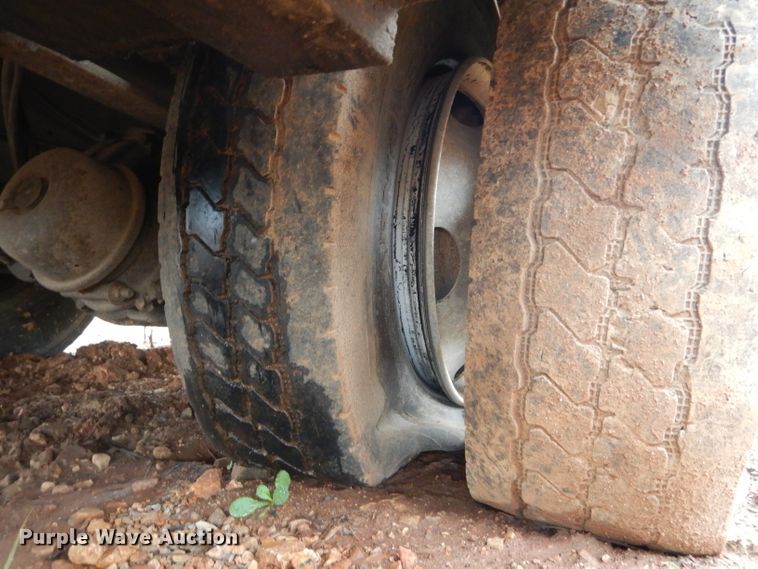 image for item DH6756 2000 Freightliner FL70 utility bed truck with crane