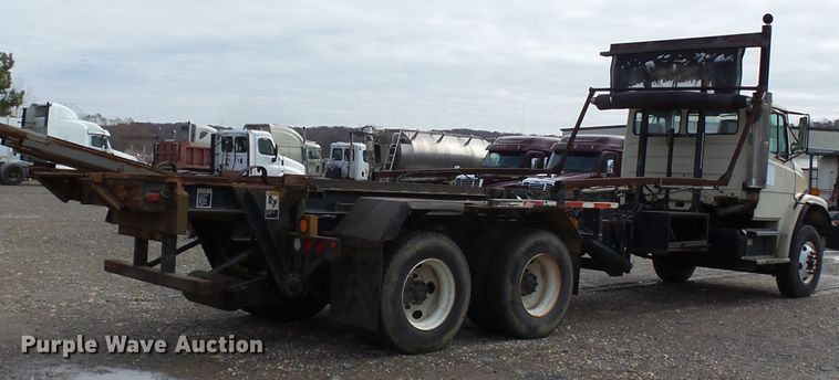 image for item DH7765 2003 Freightliner FL106 roll-off container truck