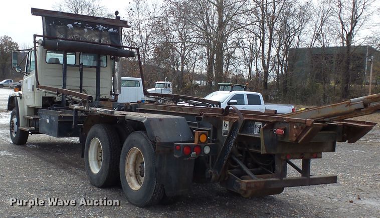 image for item DH7765 2003 Freightliner FL106 roll-off container truck