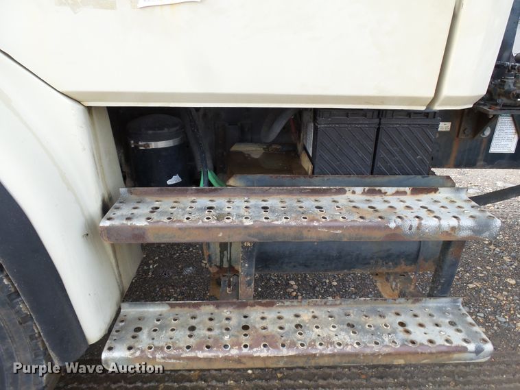 image for item DH7765 2003 Freightliner FL106 roll-off container truck