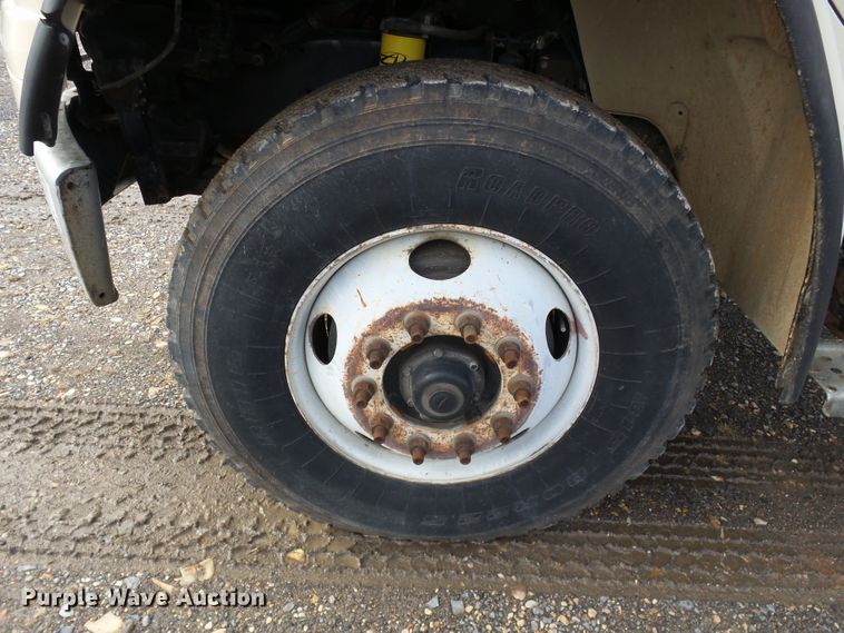 image for item DH7765 2003 Freightliner FL106 roll-off container truck