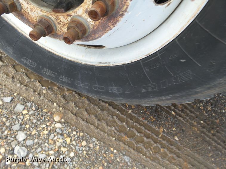 image for item DH7765 2003 Freightliner FL106 roll-off container truck