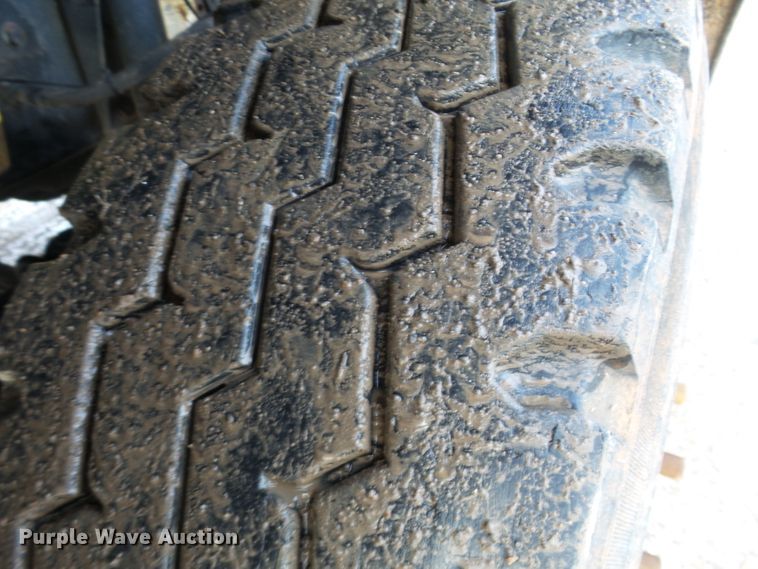 image for item DH7765 2003 Freightliner FL106 roll-off container truck