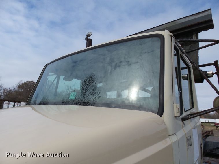 image for item DH7765 2003 Freightliner FL106 roll-off container truck