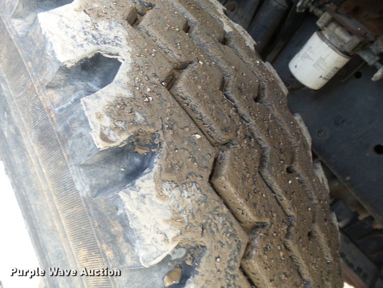 image for item DH7765 2003 Freightliner FL106 roll-off container truck