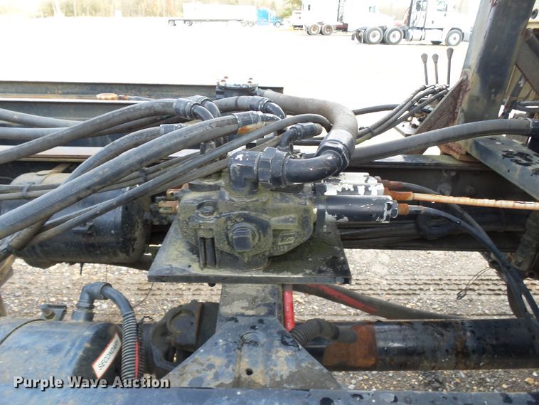 image for item DH7765 2003 Freightliner FL106 roll-off container truck