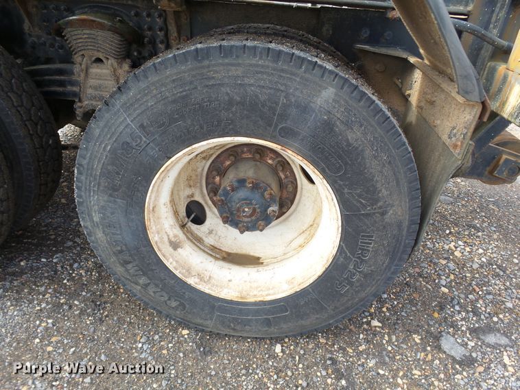 image for item DH7765 2003 Freightliner FL106 roll-off container truck