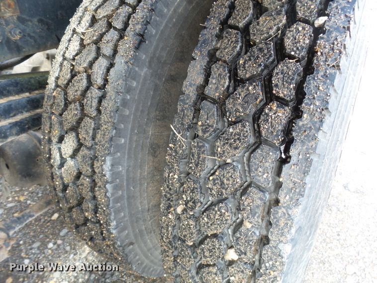 image for item DH7765 2003 Freightliner FL106 roll-off container truck