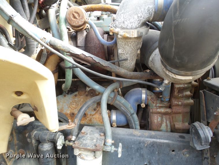 image for item DH7765 2003 Freightliner FL106 roll-off container truck