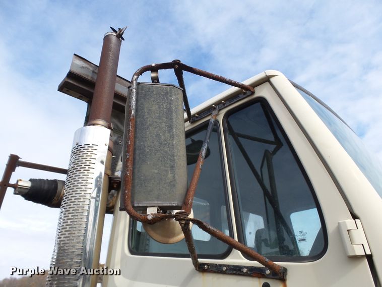 image for item DH7765 2003 Freightliner FL106 roll-off container truck