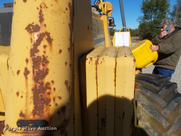 image for item DH7774 Case 860 cable plow