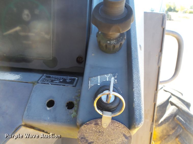 image for item DH7774 Case 860 cable plow