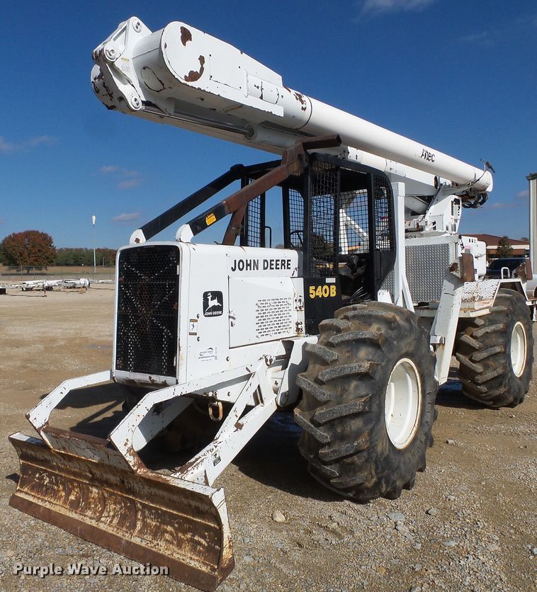 image for item DH7782 1997 John Deere 540B skidder with aerial bucket lift