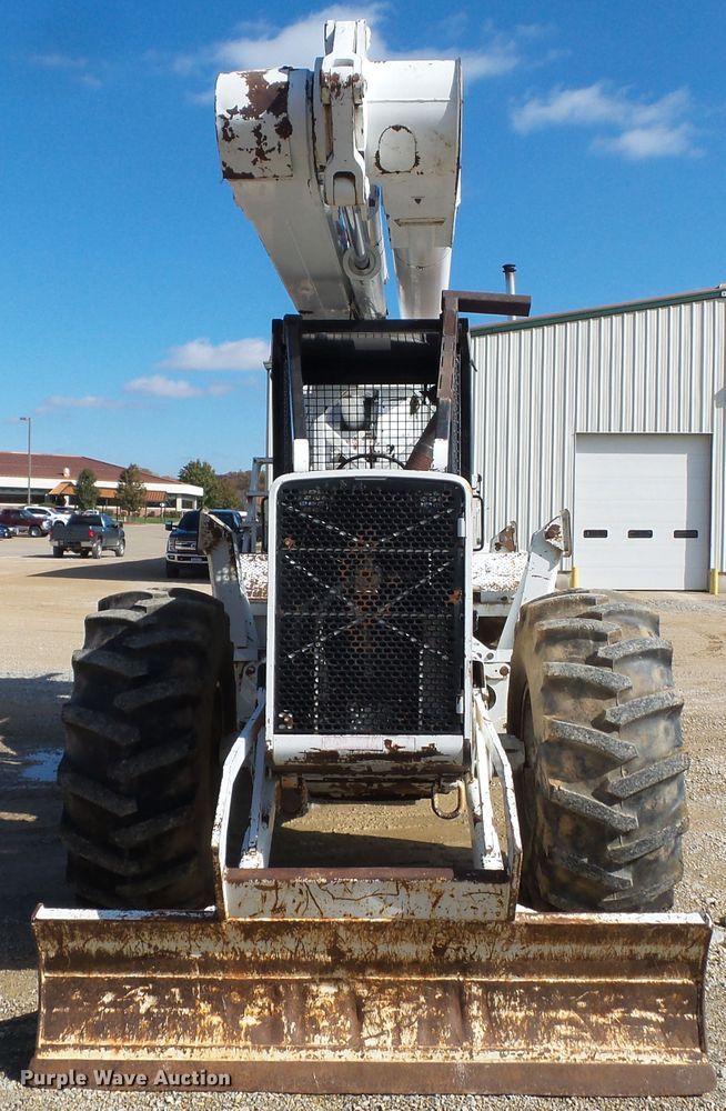 image for item DH7782 1997 John Deere 540B skidder with aerial bucket lift