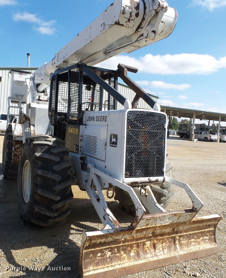 image for item DH7782 1997 John Deere 540B skidder with aerial bucket lift