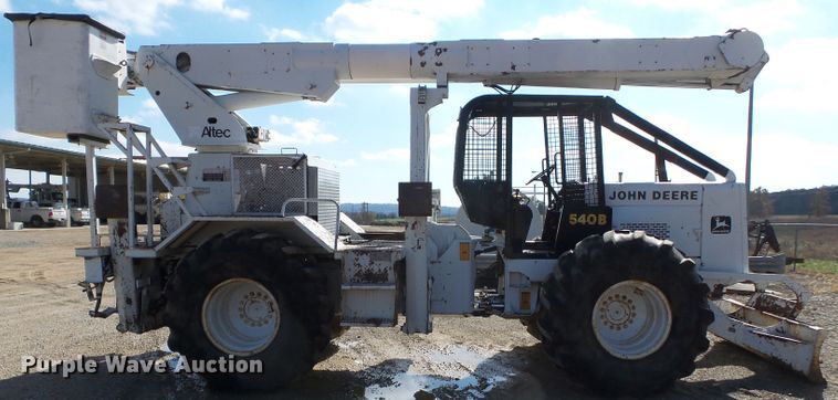 image for item DH7782 1997 John Deere 540B skidder with aerial bucket lift