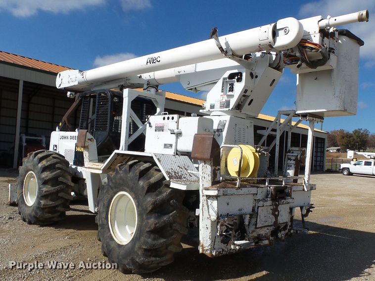 image for item DH7782 1997 John Deere 540B skidder with aerial bucket lift