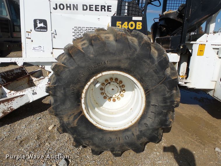 image for item DH7782 1997 John Deere 540B skidder with aerial bucket lift