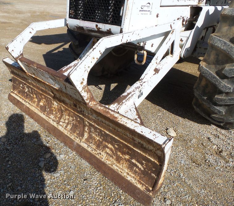 image for item DH7782 1997 John Deere 540B skidder with aerial bucket lift