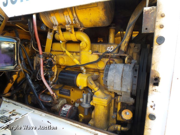 image for item DH7782 1997 John Deere 540B skidder with aerial bucket lift