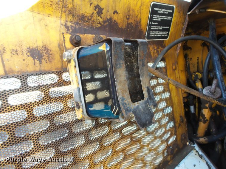 image for item DH7782 1997 John Deere 540B skidder with aerial bucket lift