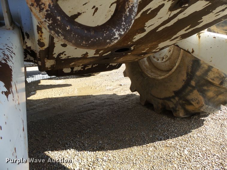 image for item DH7782 1997 John Deere 540B skidder with aerial bucket lift