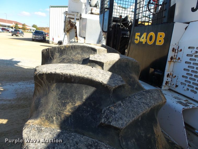 image for item DH7782 1997 John Deere 540B skidder with aerial bucket lift