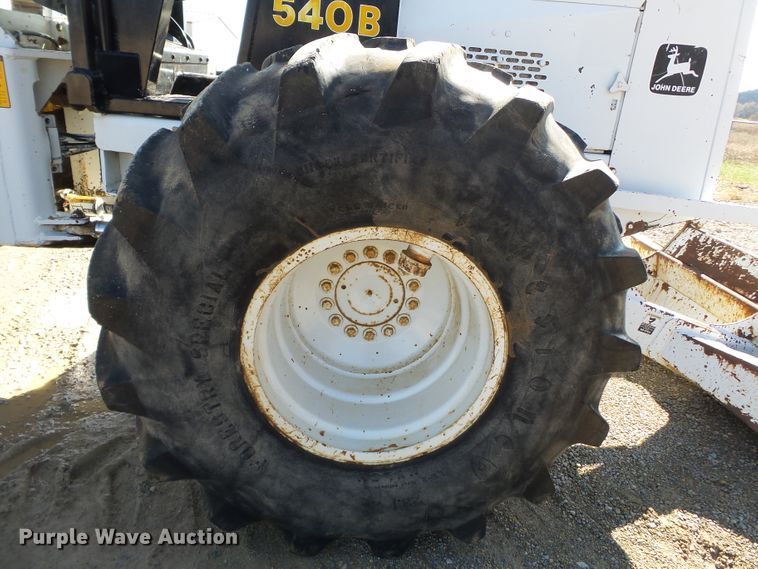 image for item DH7782 1997 John Deere 540B skidder with aerial bucket lift
