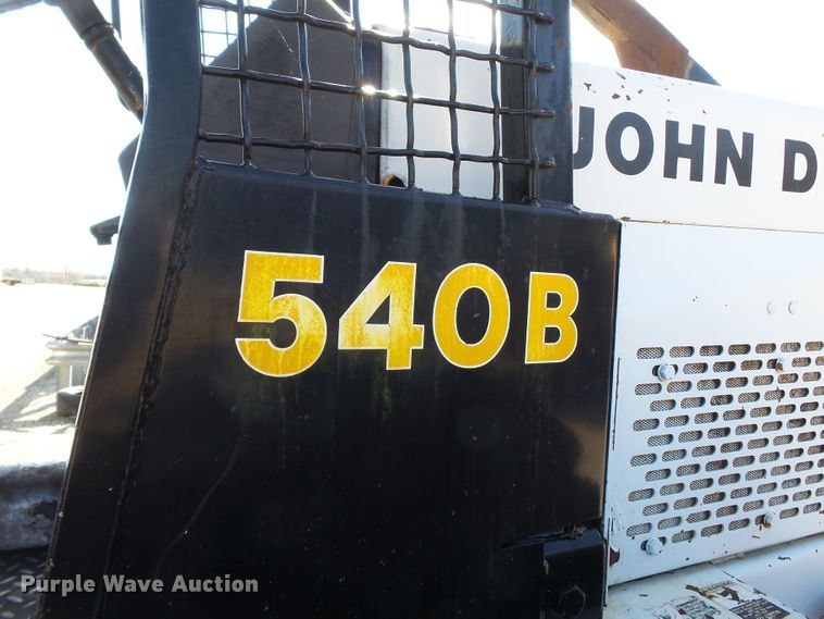 image for item DH7782 1997 John Deere 540B skidder with aerial bucket lift
