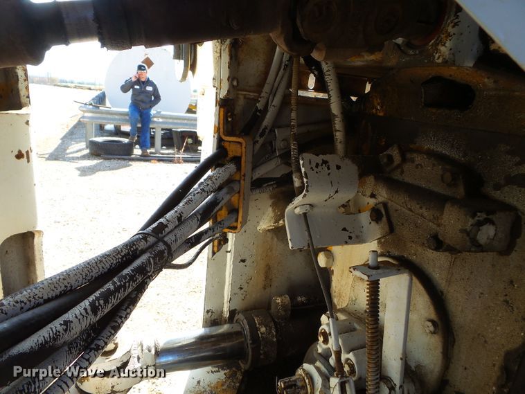 image for item DH7782 1997 John Deere 540B skidder with aerial bucket lift