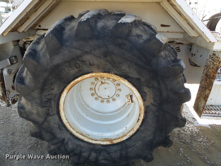 image for item DH7782 1997 John Deere 540B skidder with aerial bucket lift