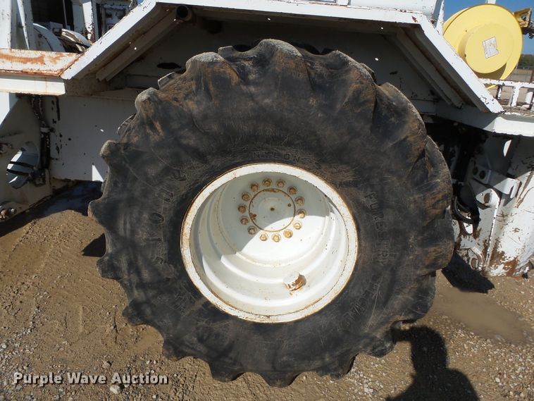 image for item DH7782 1997 John Deere 540B skidder with aerial bucket lift