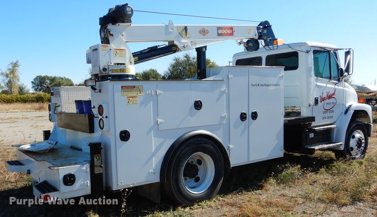 image for item FK9967 2004 Freightliner FL70 utility bed truck with crane