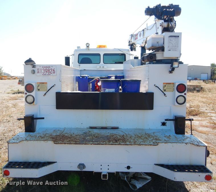 image for item FK9967 2004 Freightliner FL70 utility bed truck with crane