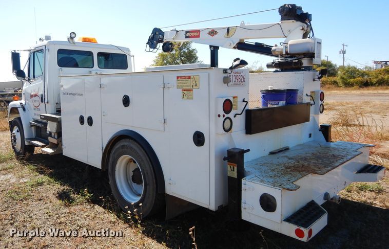 image for item FK9967 2004 Freightliner FL70 utility bed truck with crane