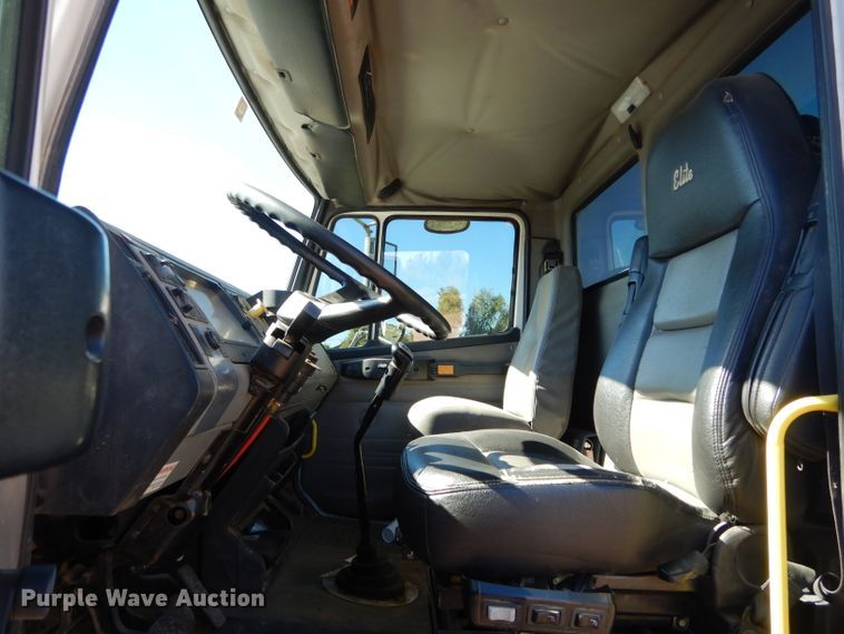 image for item FK9967 2004 Freightliner FL70 utility bed truck with crane