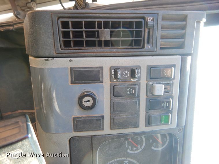 image for item FK9967 2004 Freightliner FL70 utility bed truck with crane