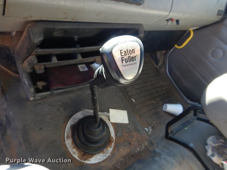 image for item FK9967 2004 Freightliner FL70 utility bed truck with crane