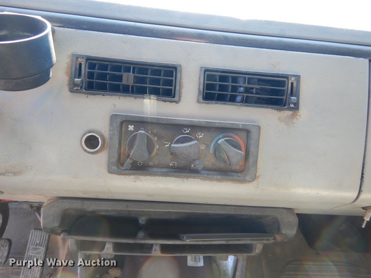 image for item FK9967 2004 Freightliner FL70 utility bed truck with crane