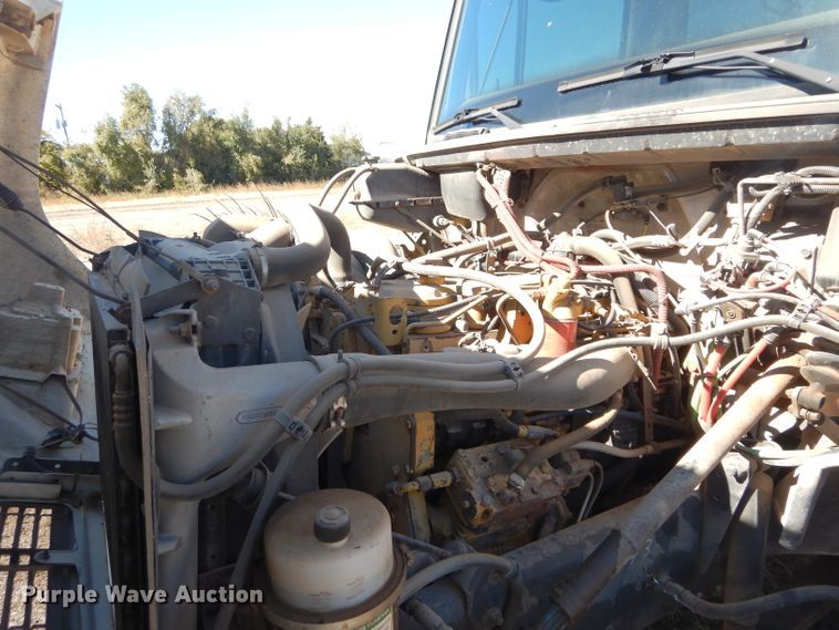 image for item FK9967 2004 Freightliner FL70 utility bed truck with crane