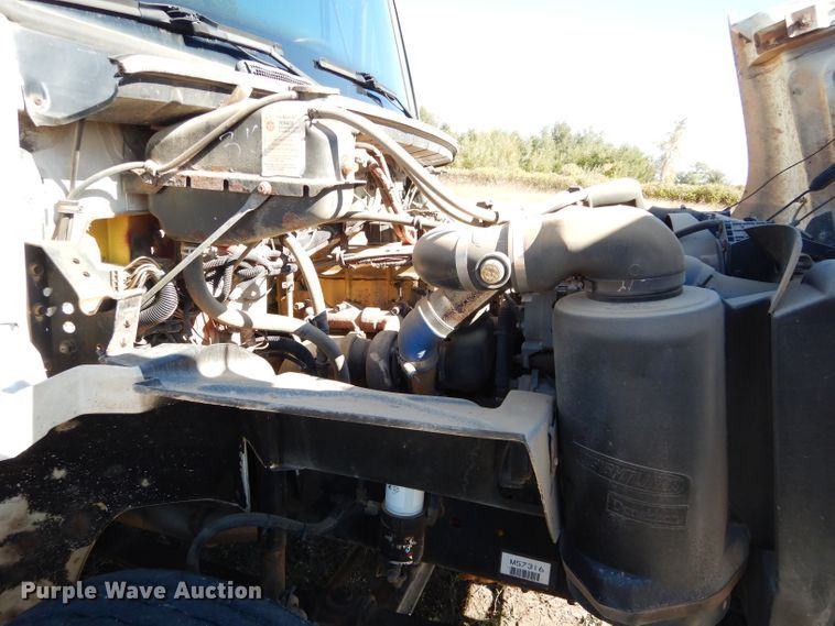 image for item FK9967 2004 Freightliner FL70 utility bed truck with crane